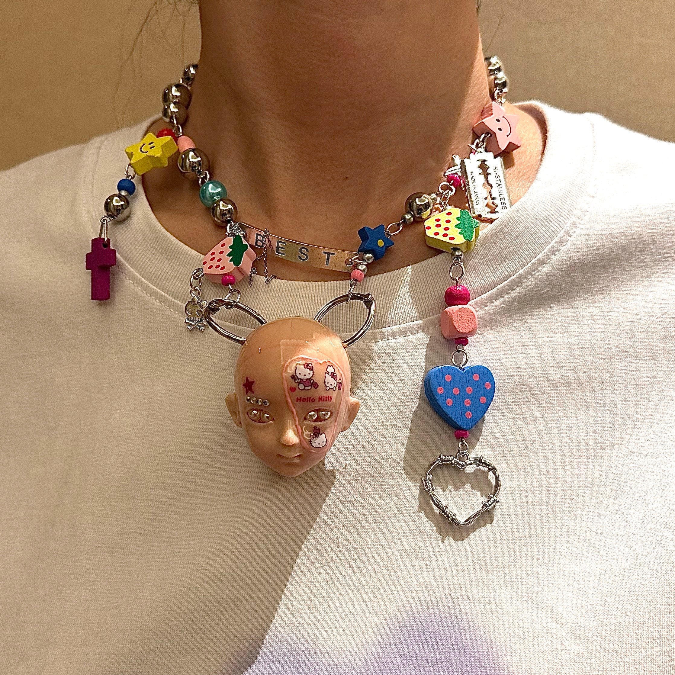 Y2K Decora Pink Doll Face Necklace with Smiley Star, Strawberry & Razor Blade Charms