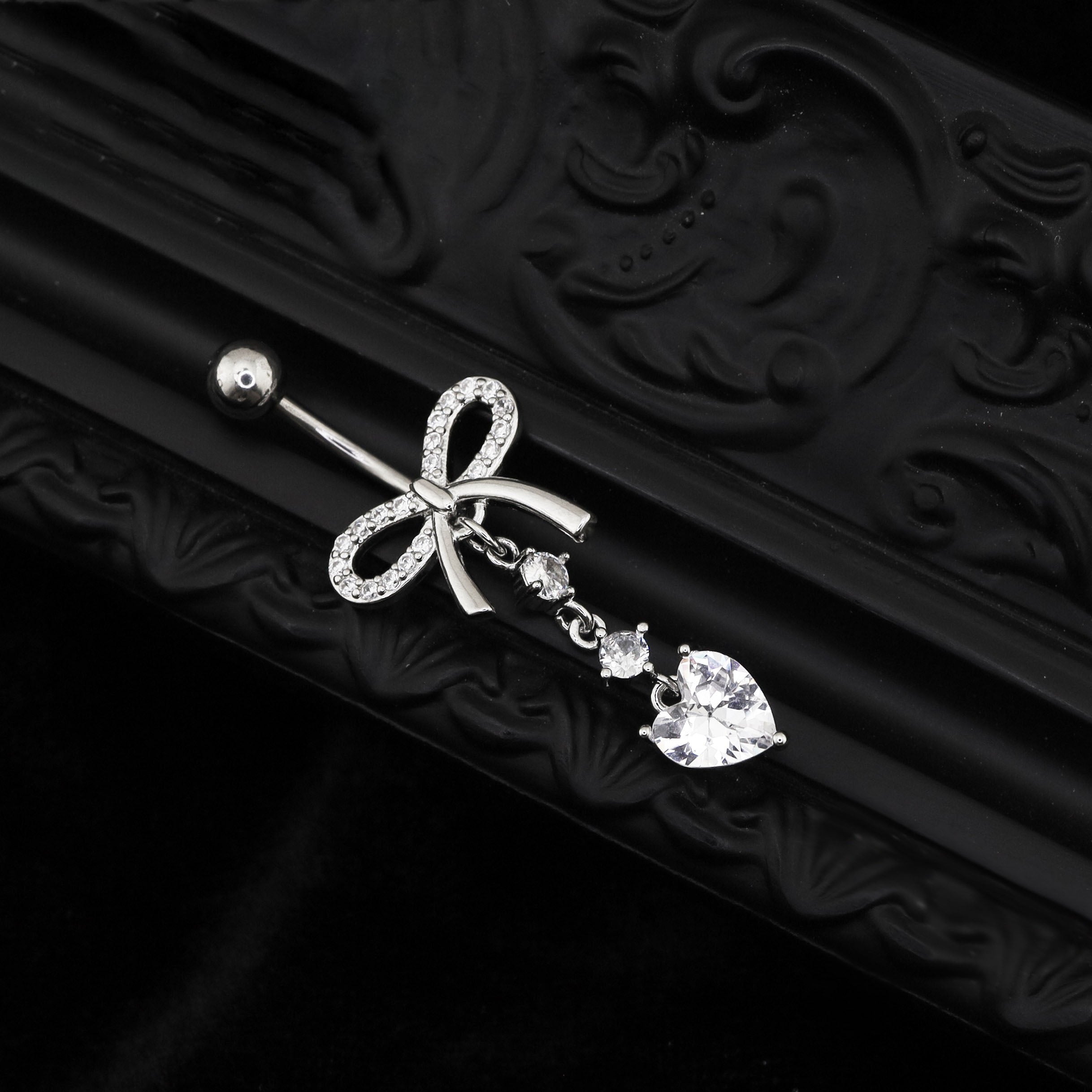 Heart-shaped CZ bow tie Dangle Belly Ring