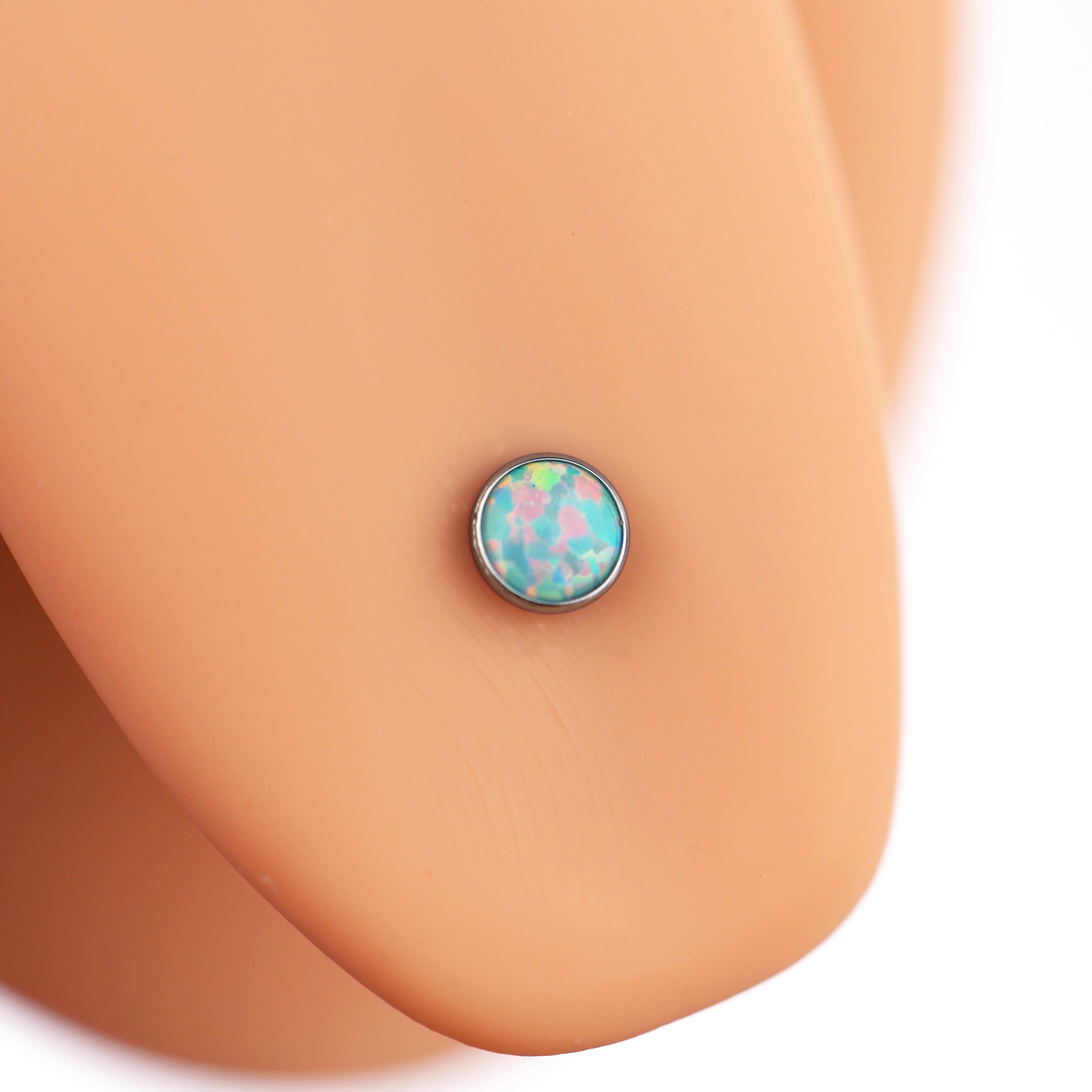Flat opal Titanium Internally Threaded tongue stud