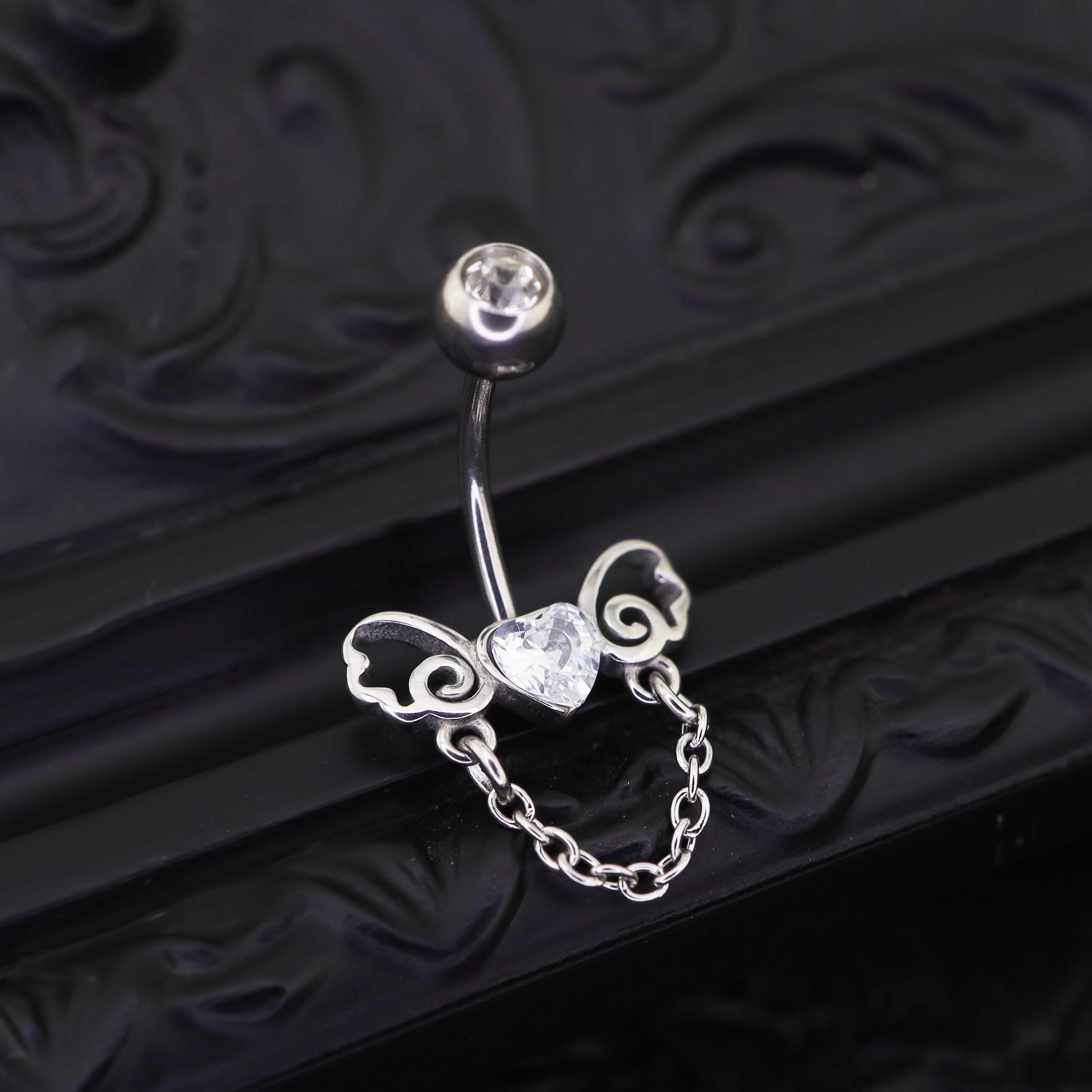 Heart-shaped CZ bow tie Dangle Belly Ring