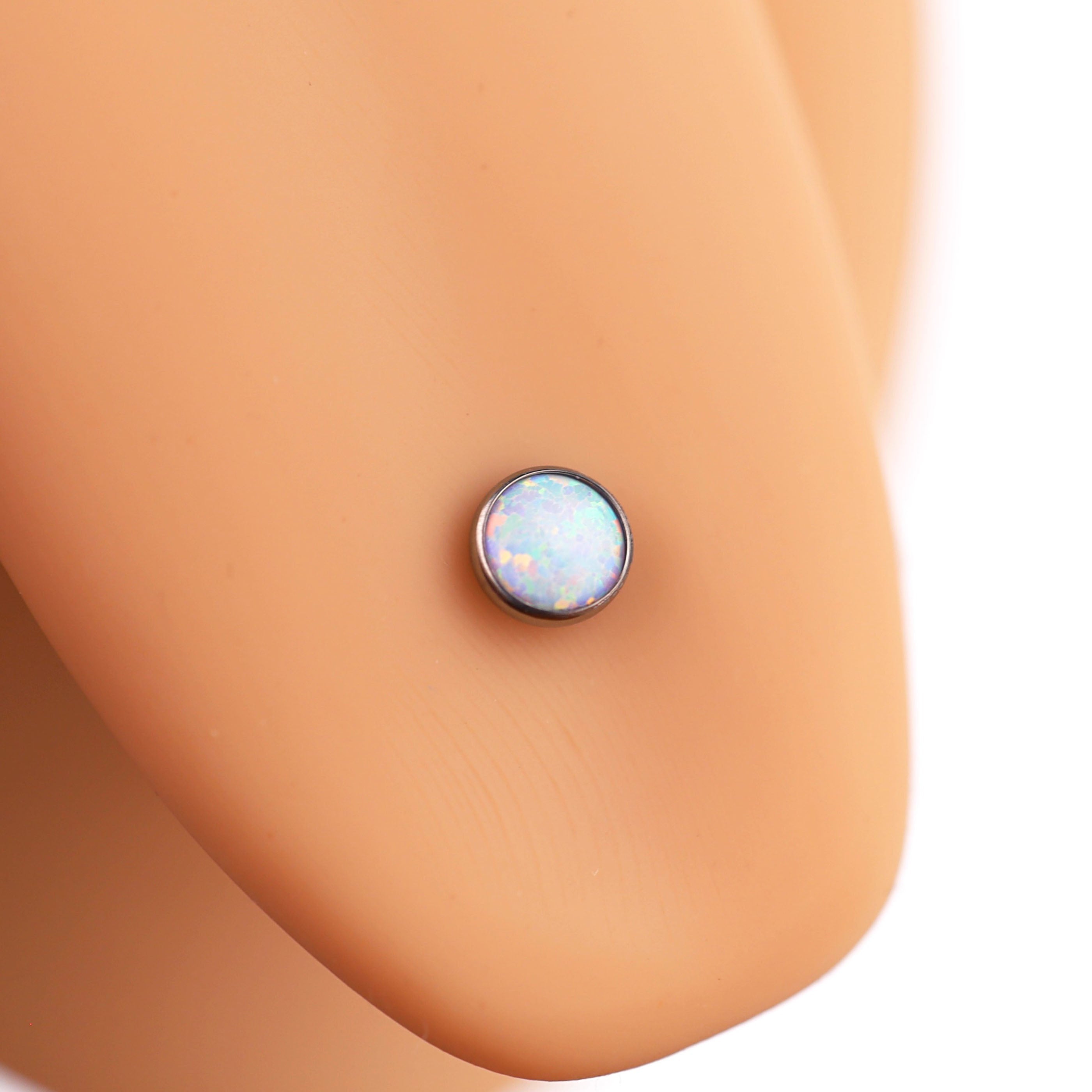 Flat opal Titanium Internally Threaded tongue stud