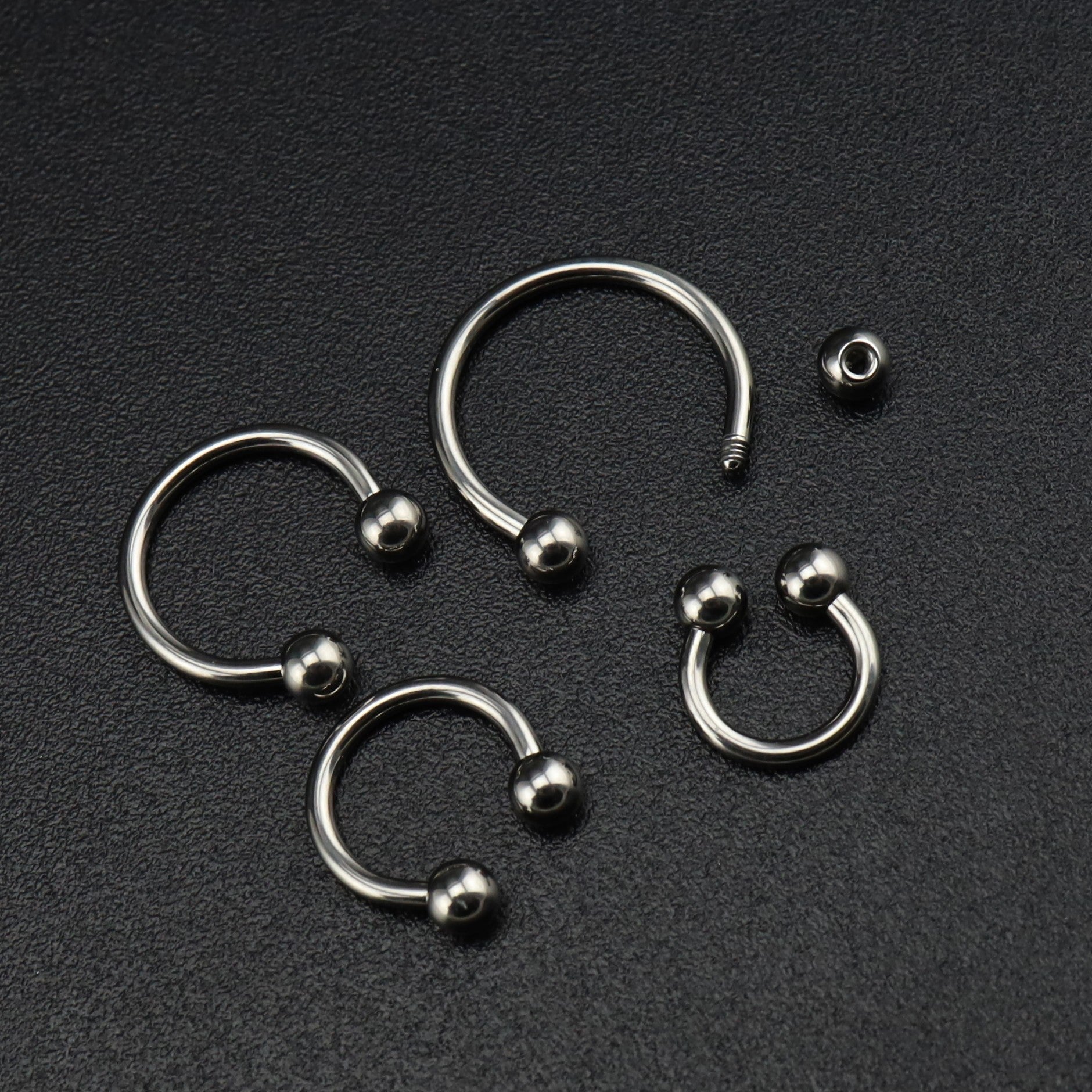 Classic Externally Threaded Titanium Horseshoe ring