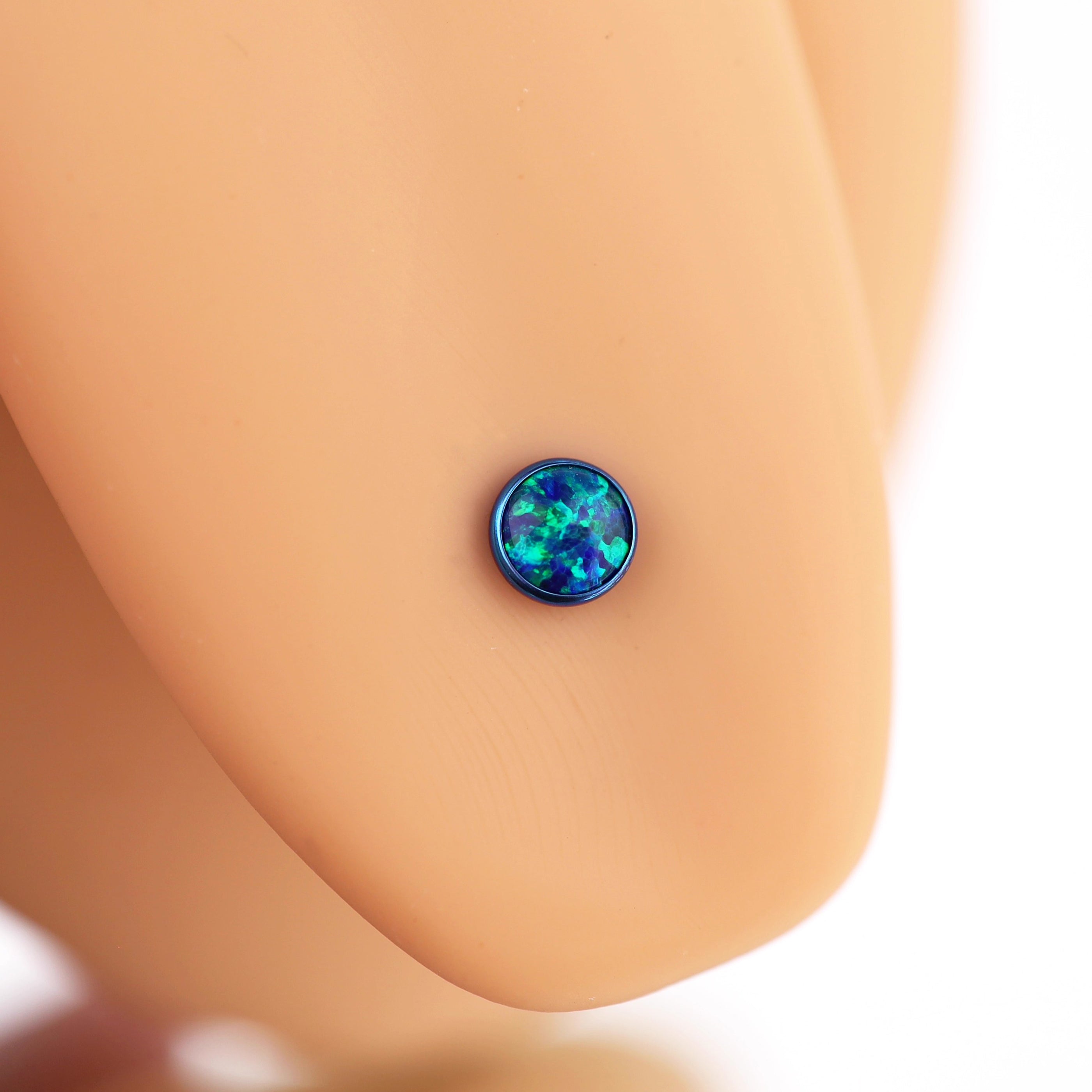 Flat opal Titanium Internally Threaded tongue stud