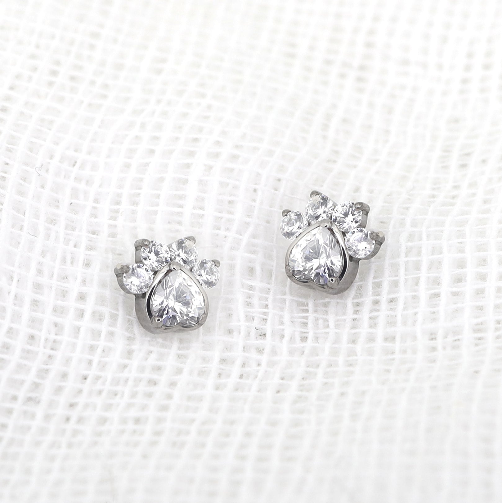 White CZ Cat Paw Titanium Studs