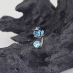 3D Blue Resin Rose & CZ Titanium Horseshoe Rings
