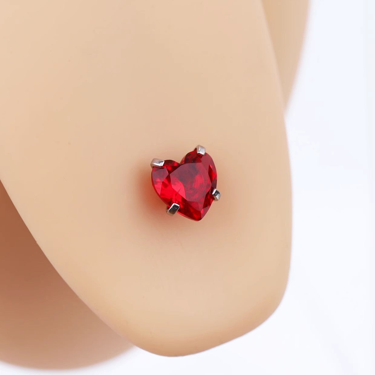 Heart-shaped CZ tongue stud