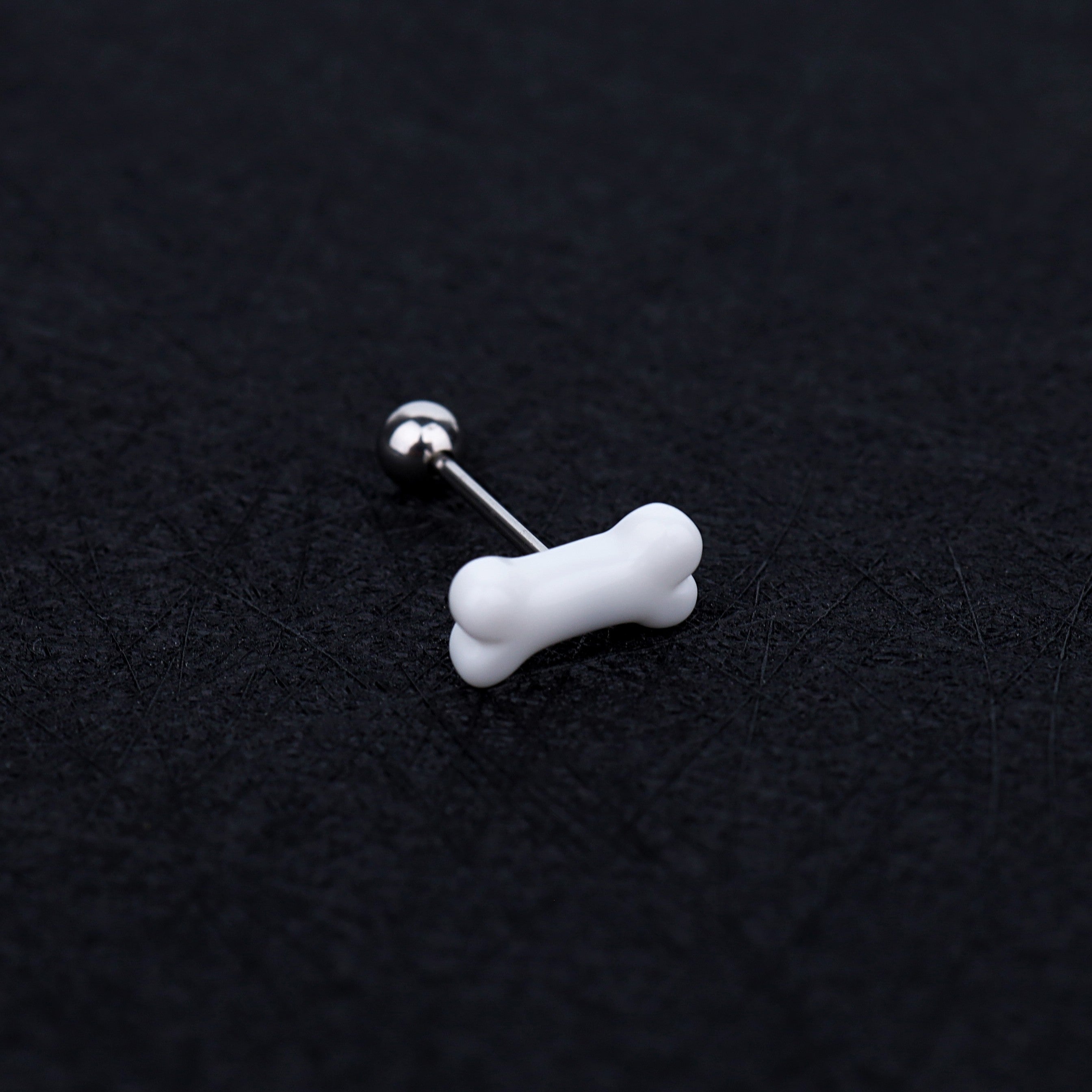 Resin white bone stainless steel tongue stud