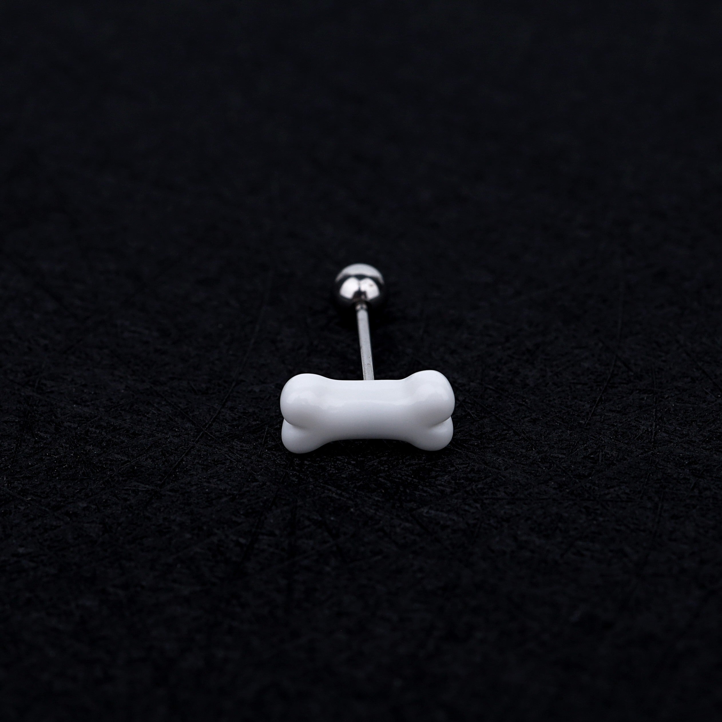 Resin white bone stainless steel tongue stud
